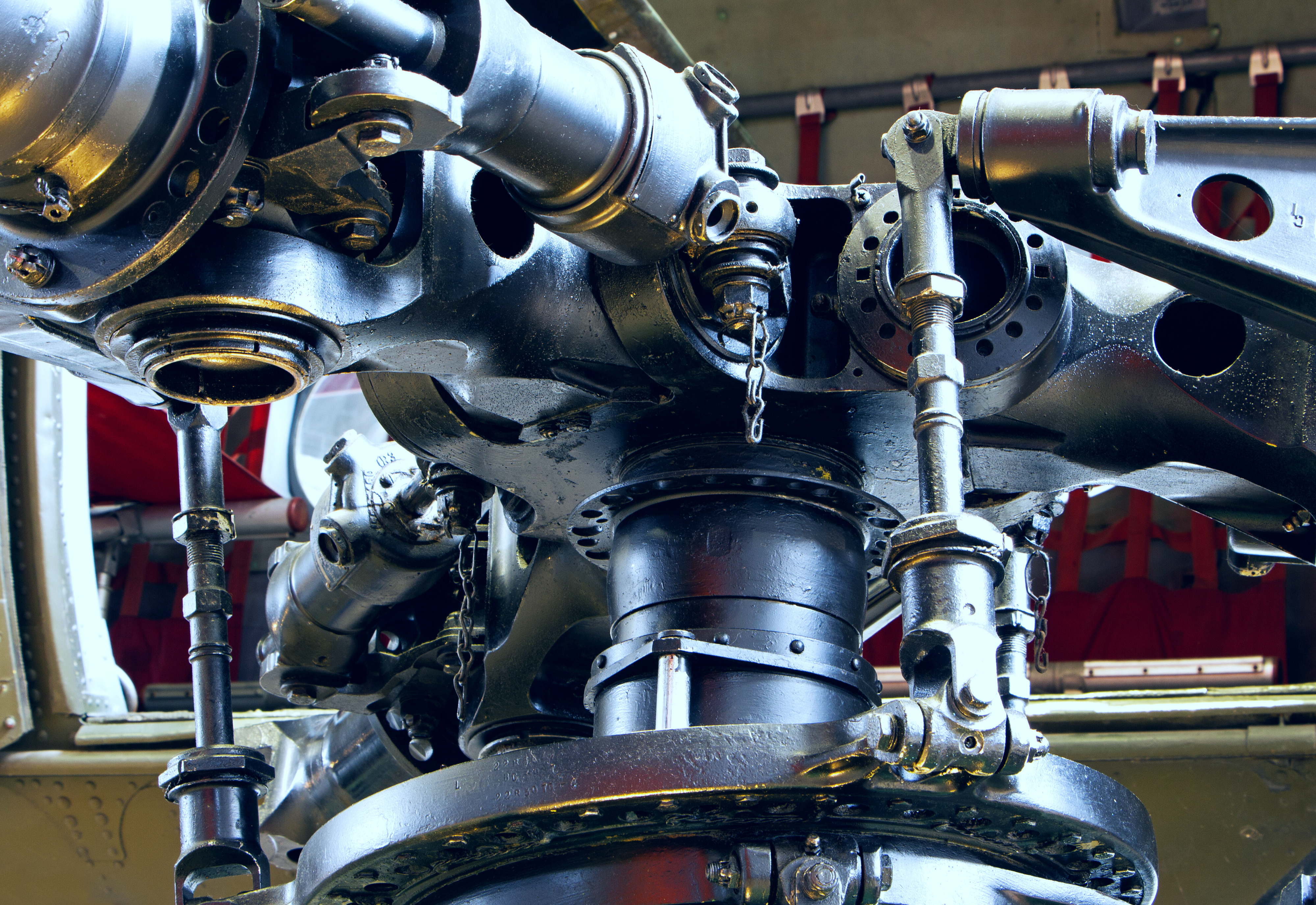 The mechanical parts of a helicopter propeller, representing the work required in helicopter mechanic jobs overseas.