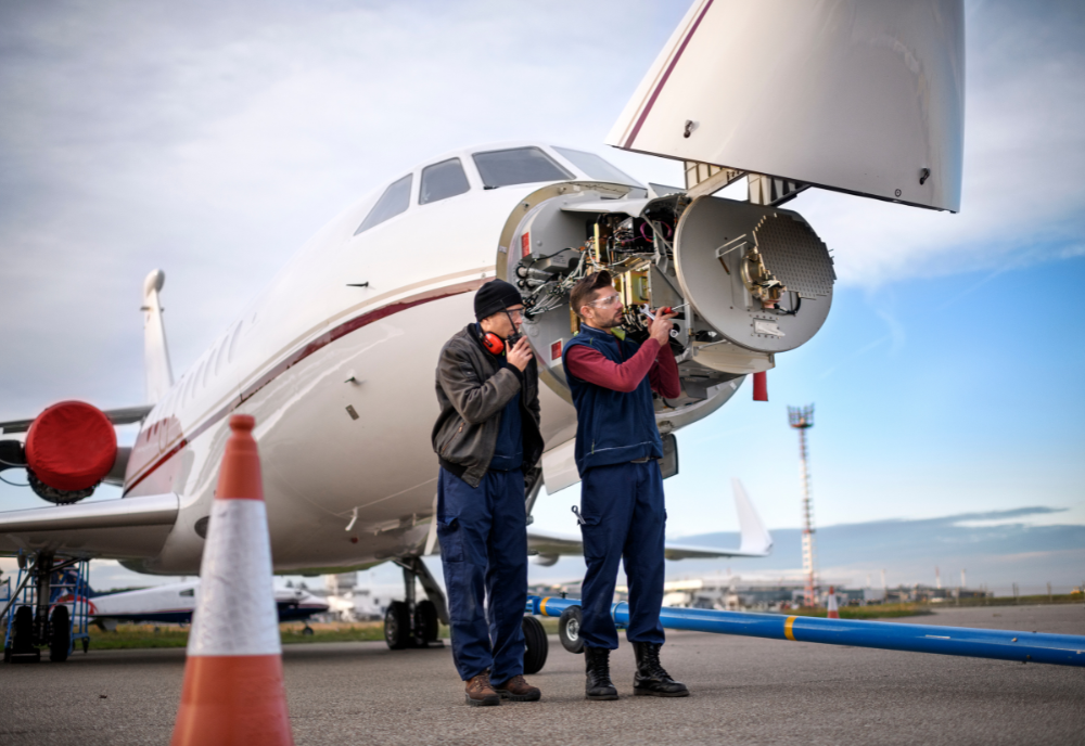 2 aviation mechanics demonstrating how to become an aviation mechanic