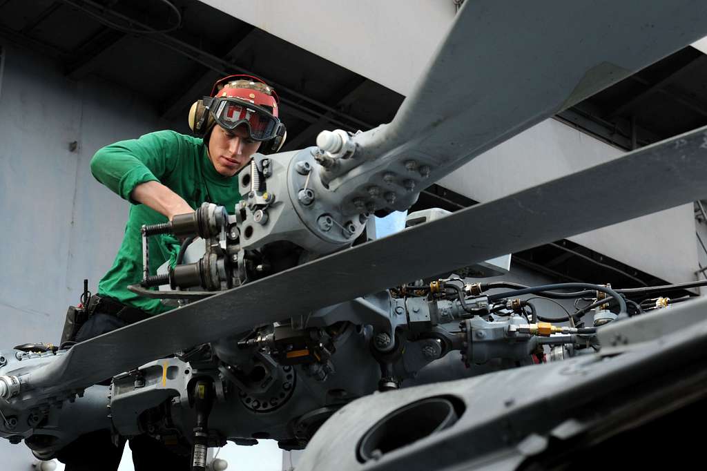 Aviation mechanic working on a project as part of their aviation career opportunities
